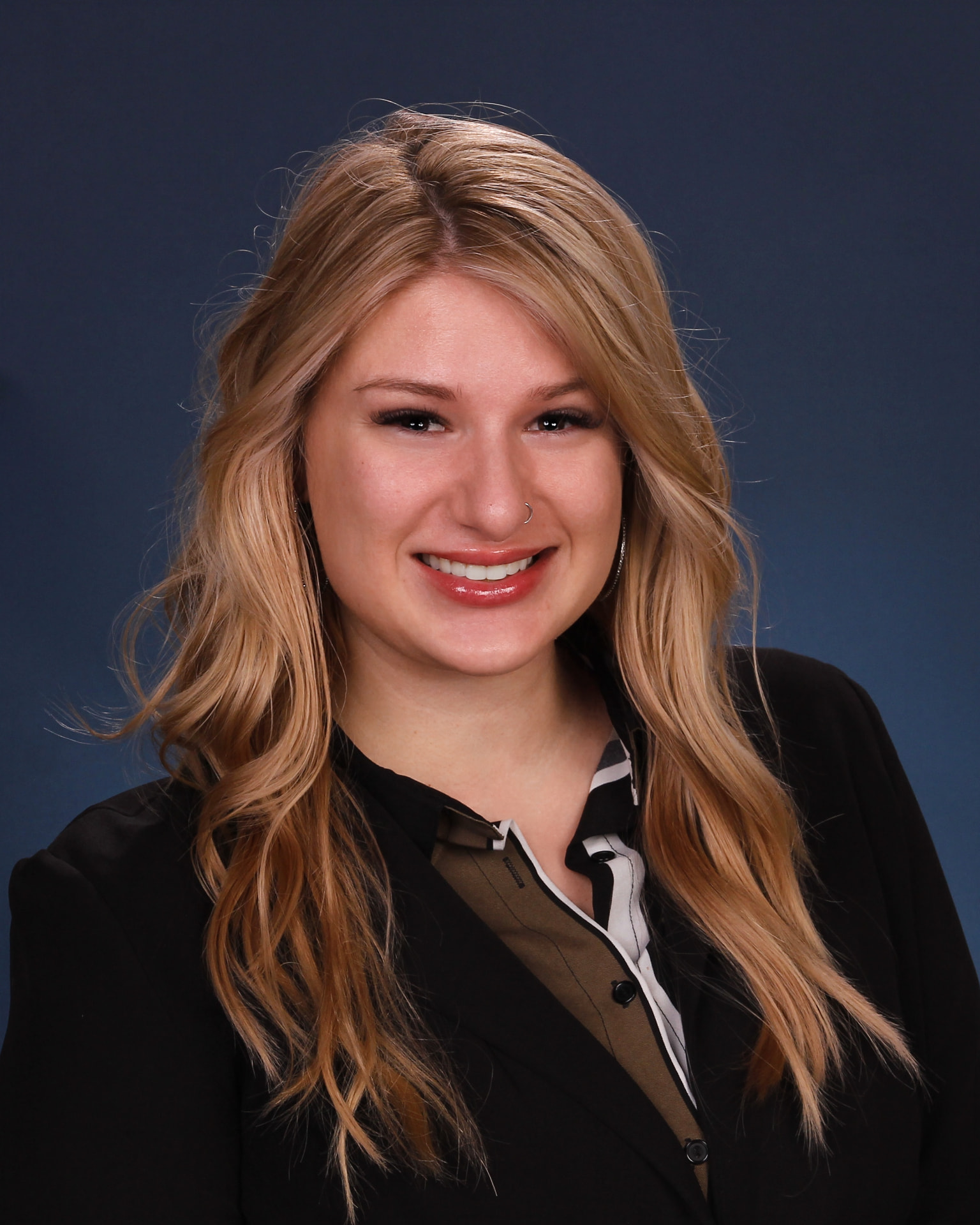 Portrait of McKenzie McCarty, Chief Strategy Officer and Travel Advisor at Susan's Travel Services