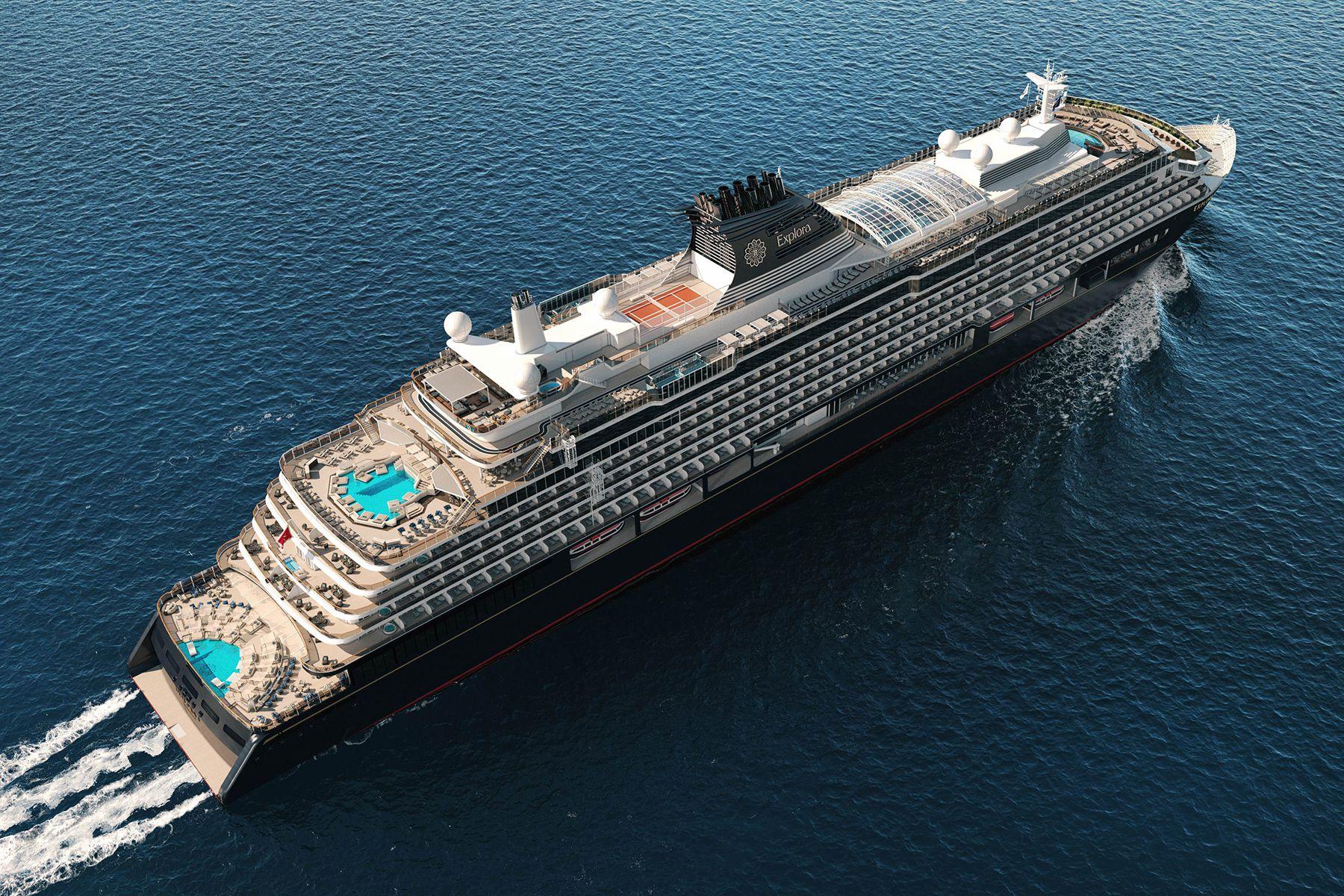 Aerial view of an Explora Journeys ship sailing on deep blue open ocean